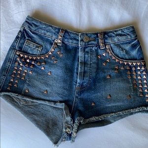 Topshop mid waisted jean shorts with studs